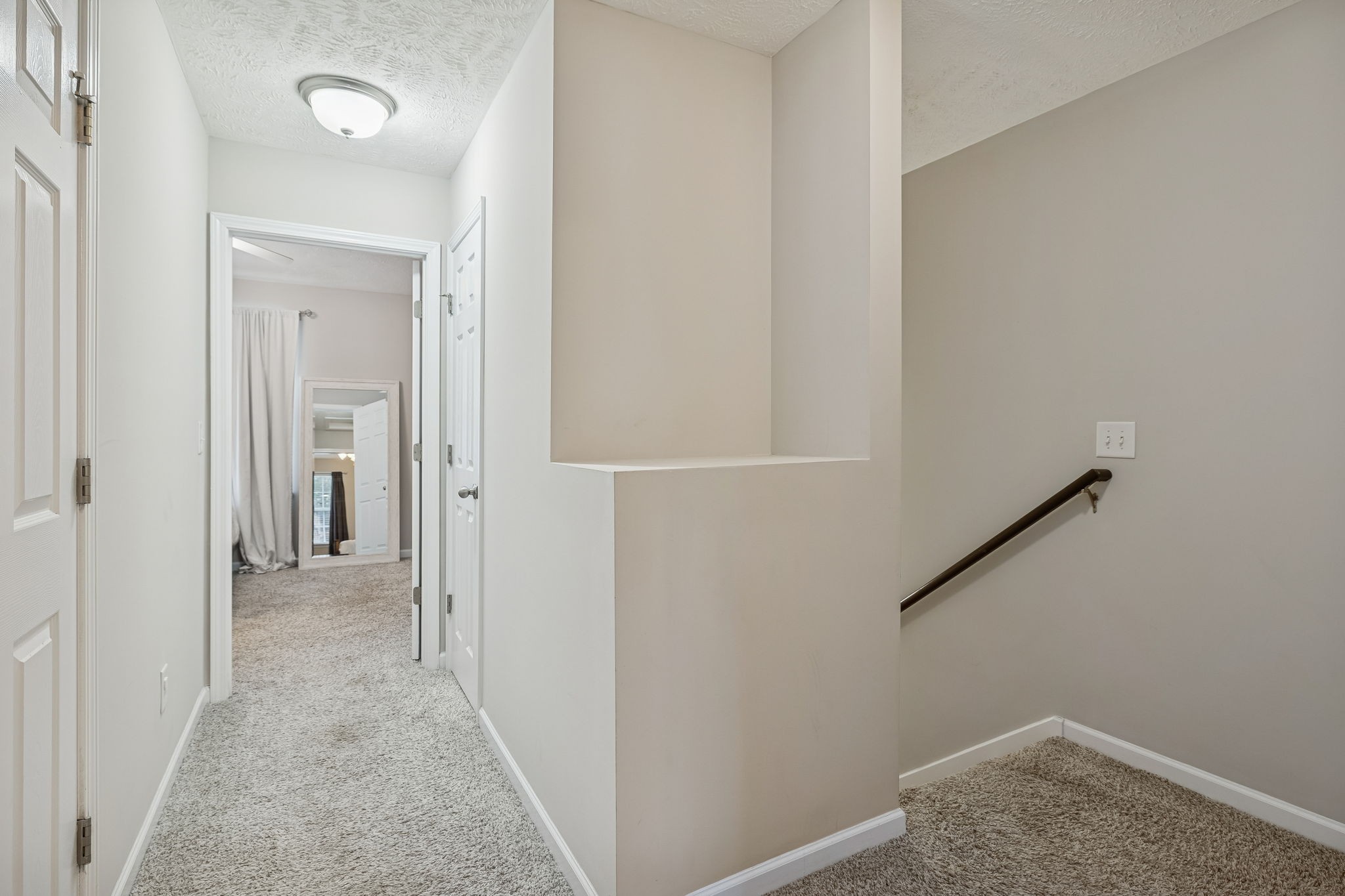 1834 Shaylin Loop Antioch, TN 37013 - Photo 14 of 28 a view of a hallway with wooden floor