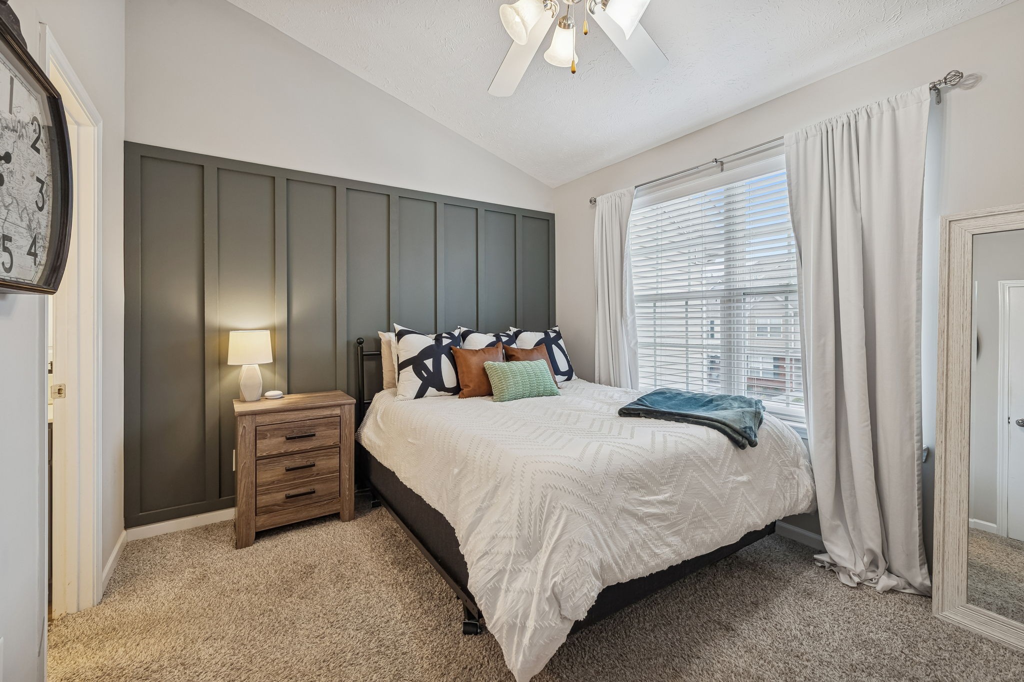 1834 Shaylin Loop Antioch, TN 37013 - Photo 15 of 28 a bedroom with a bed and a chandelier