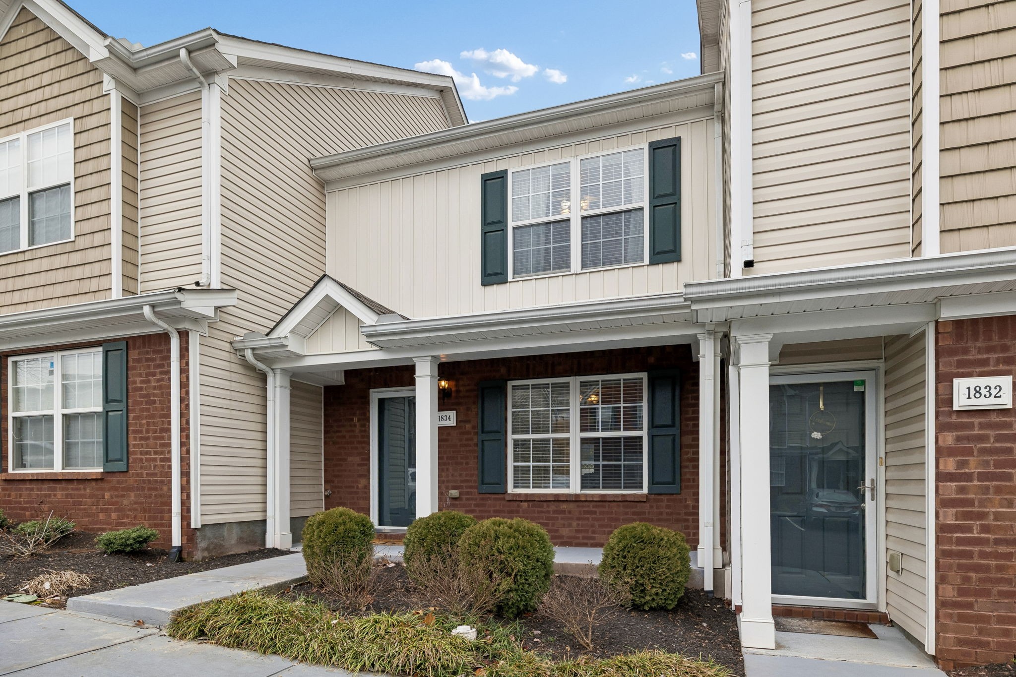1834 Shaylin Loop Antioch, TN 37013 - Photo 2 of 28 a front view of a house with plants