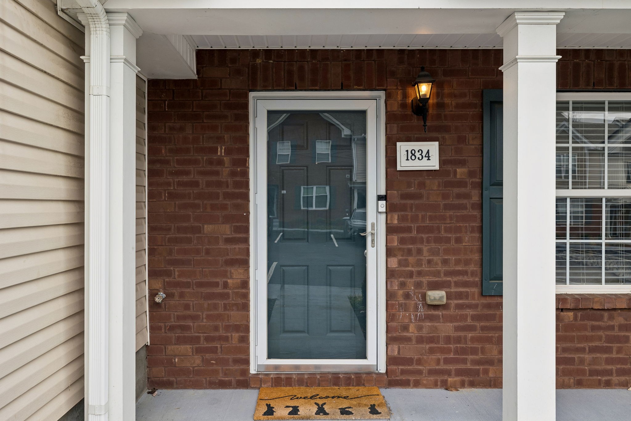 1834 Shaylin Loop Antioch, TN 37013 - Photo 3 of 28 a front view of a house with a glass door