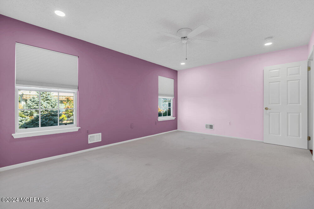 18 Mayapple Drive Brick, NJ 08724 - Photo 23 of 41 an empty room with windows