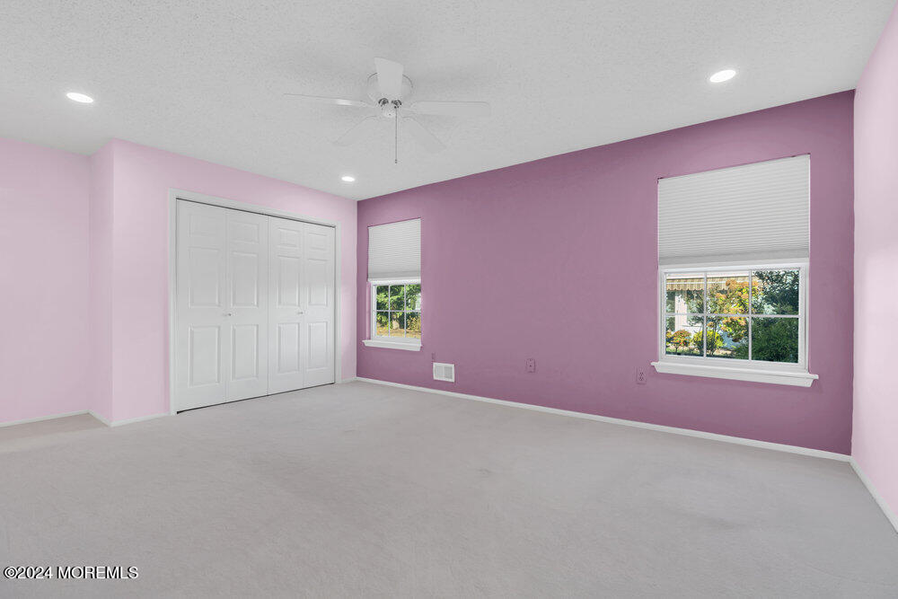 18 Mayapple Drive Brick, NJ 08724 - Photo 24 of 41 an empty room with windows and closet