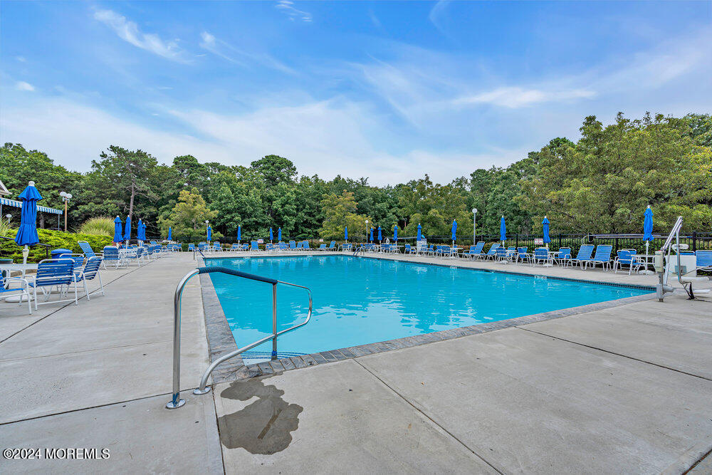18 Mayapple Drive Brick, NJ 08724 - Photo 36 of 41 a view of swimming pool and lake view