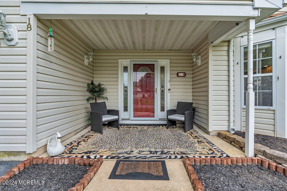 18 Mayapple Drive Brick, NJ 08724 - Photo 4 of 41 a view of a entryway door front of house