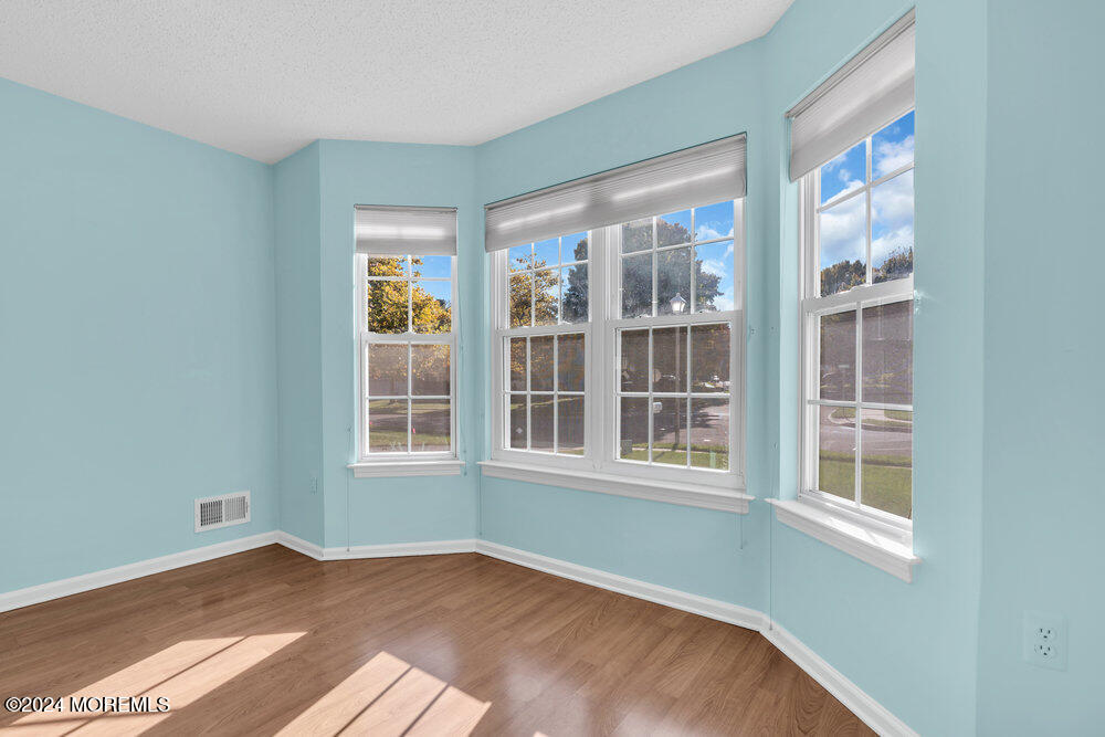 18 Mayapple Drive Brick, NJ 08724 - Photo 7 of 41 a view of an empty room with a window