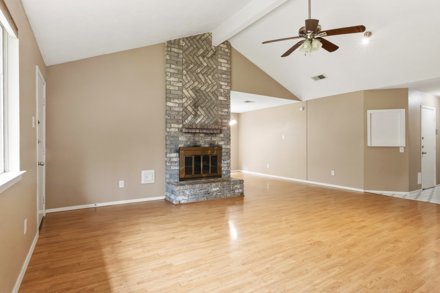 2531 North Spring Drive Spring, TX 77373 - Photo 6 of 24 a view of empty room with wooden floor and fireplace