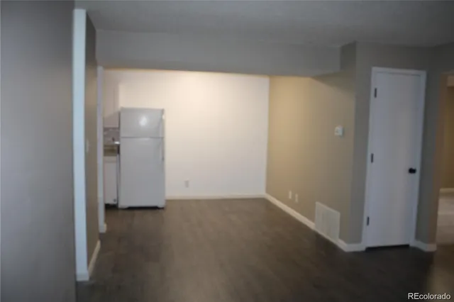 a bathroom with a toilet and shower