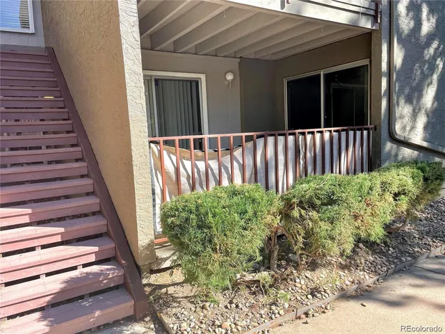 a view of a backyard of the house