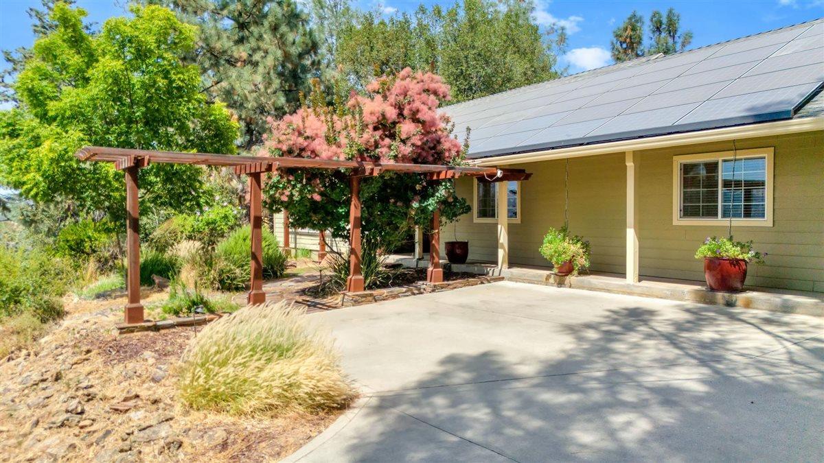 2441 Quail Hill Road Copperopolis, CA 95228 - Photo 9 of 91 A lovely trellis leads to your front porch.