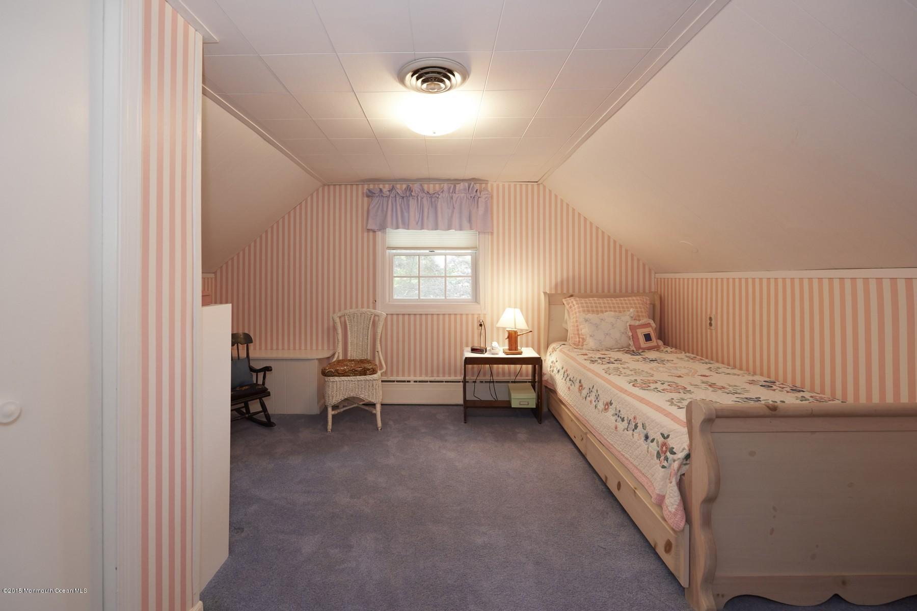 150 Bowne Road Middletown, NJ 07716 - Photo 14 of 20 a room with a bed and a window