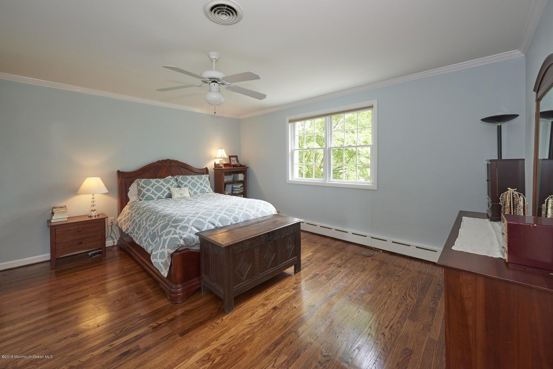 150 Bowne Road Middletown, NJ 07716 - Photo 10 of 20 a bedroom with a bed and a desk