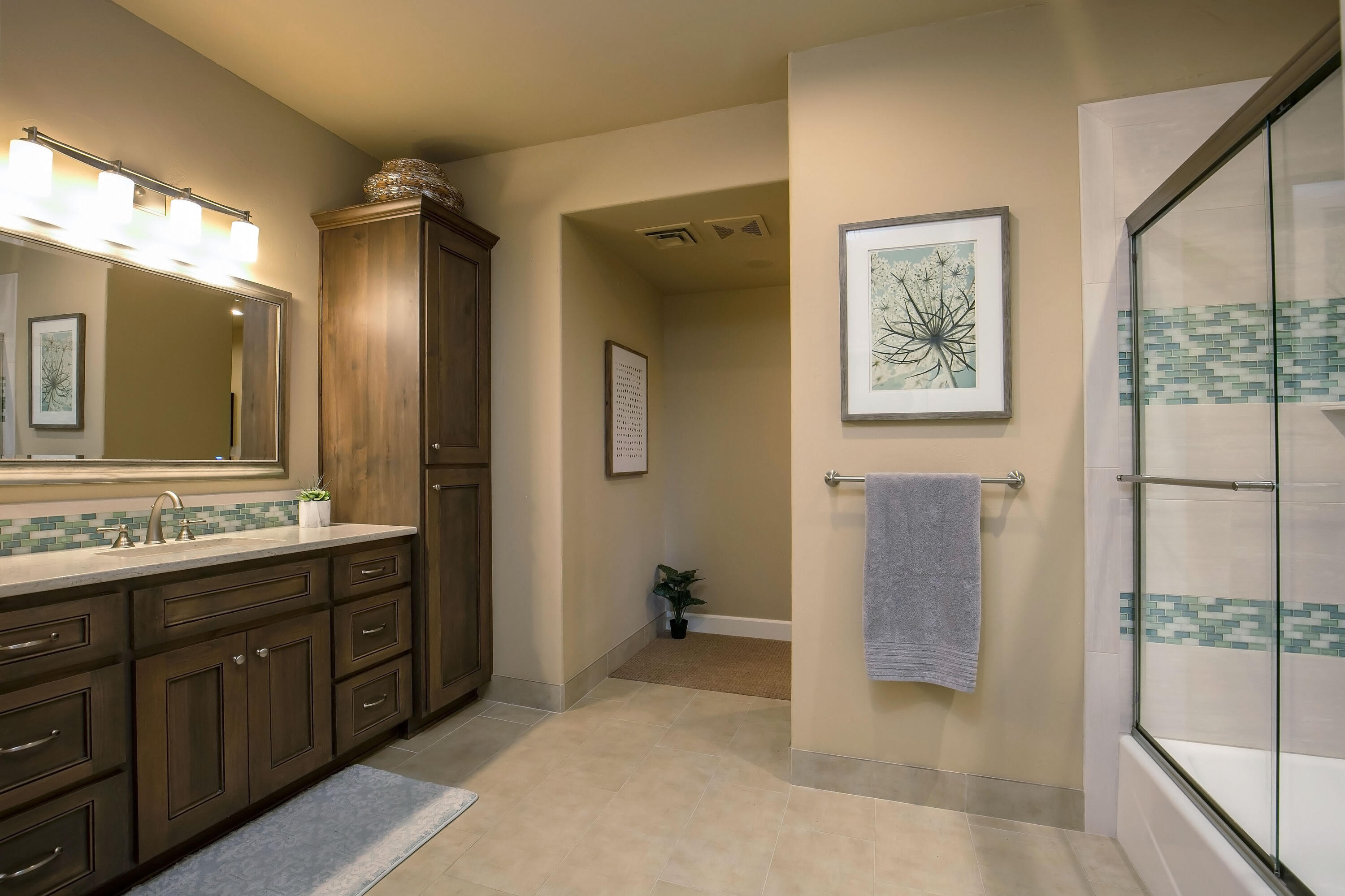 69015 Hurtley Ranch Road Sisters, OR 97759 - Photo 42 of 88 Attached full bath with radiant floor heat, walk-in shower, quartz countertops and commode room