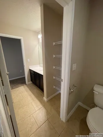 a bathroom with a sink and toilet