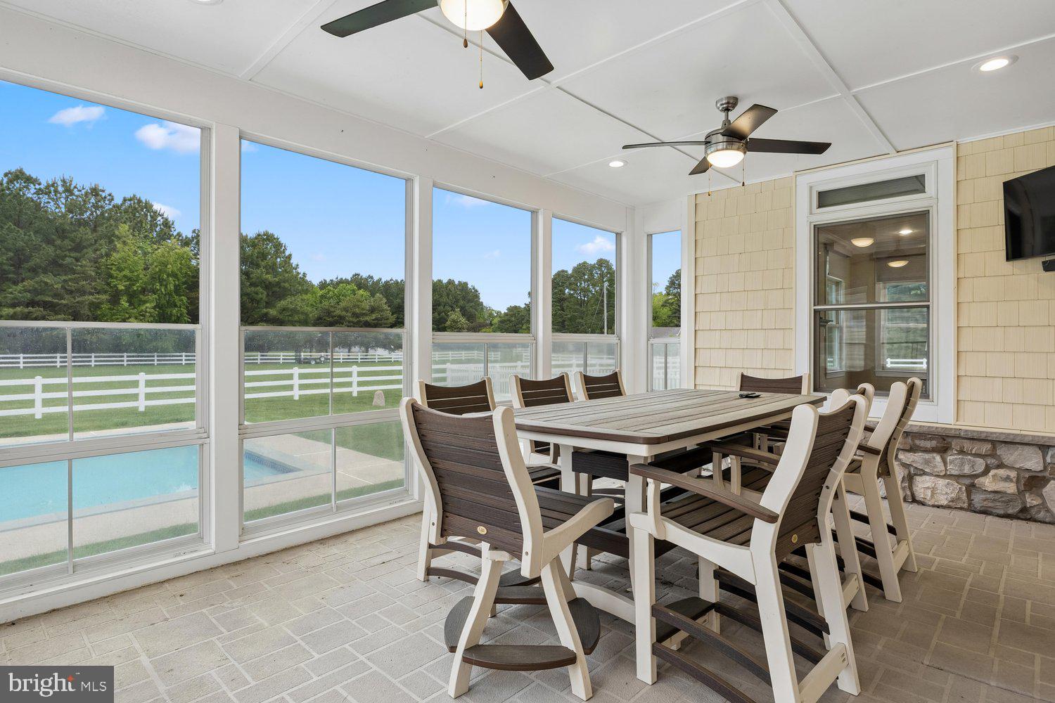 313 Wye Road Queenstown, MD 21658 - Photo 107 of 132 Serene screened porch with poolside views.