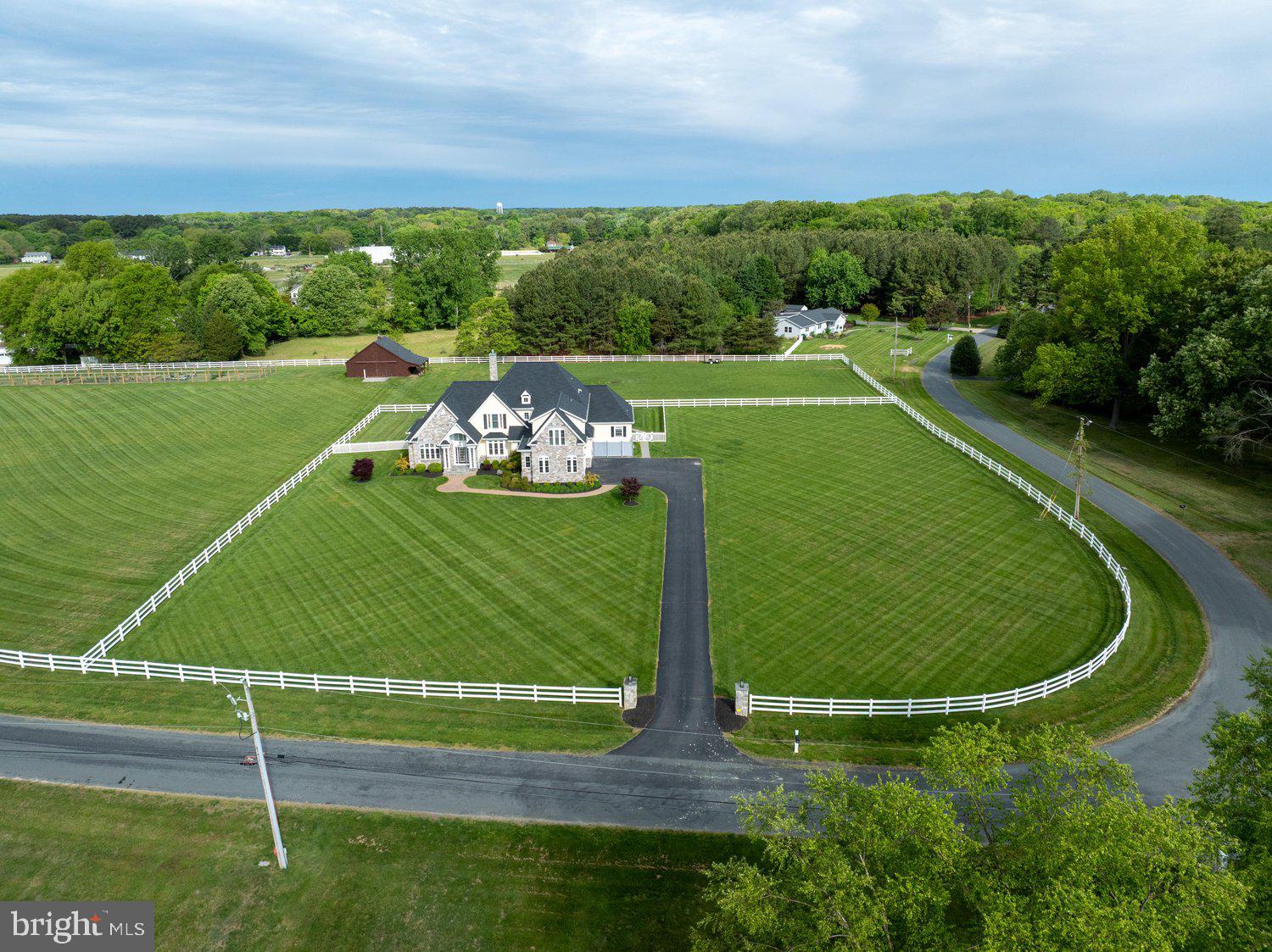 313 Wye Road Queenstown, MD 21658 - Photo 11 of 132 Sprawling estate with lush green surroundings.