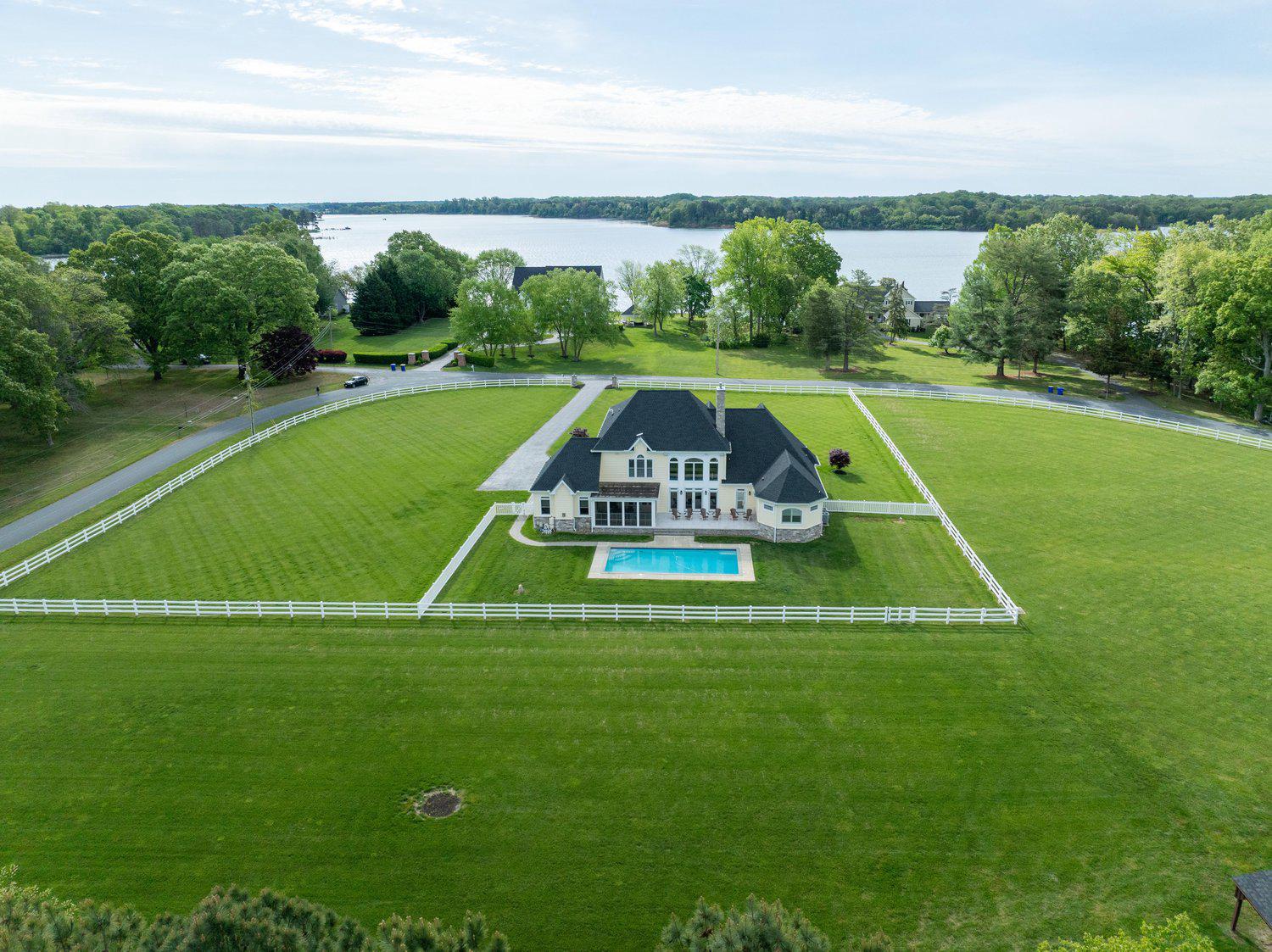 313 Wye Road Queenstown, MD 21658 - Photo 13 of 132 River view luxury with expansive green lawns.