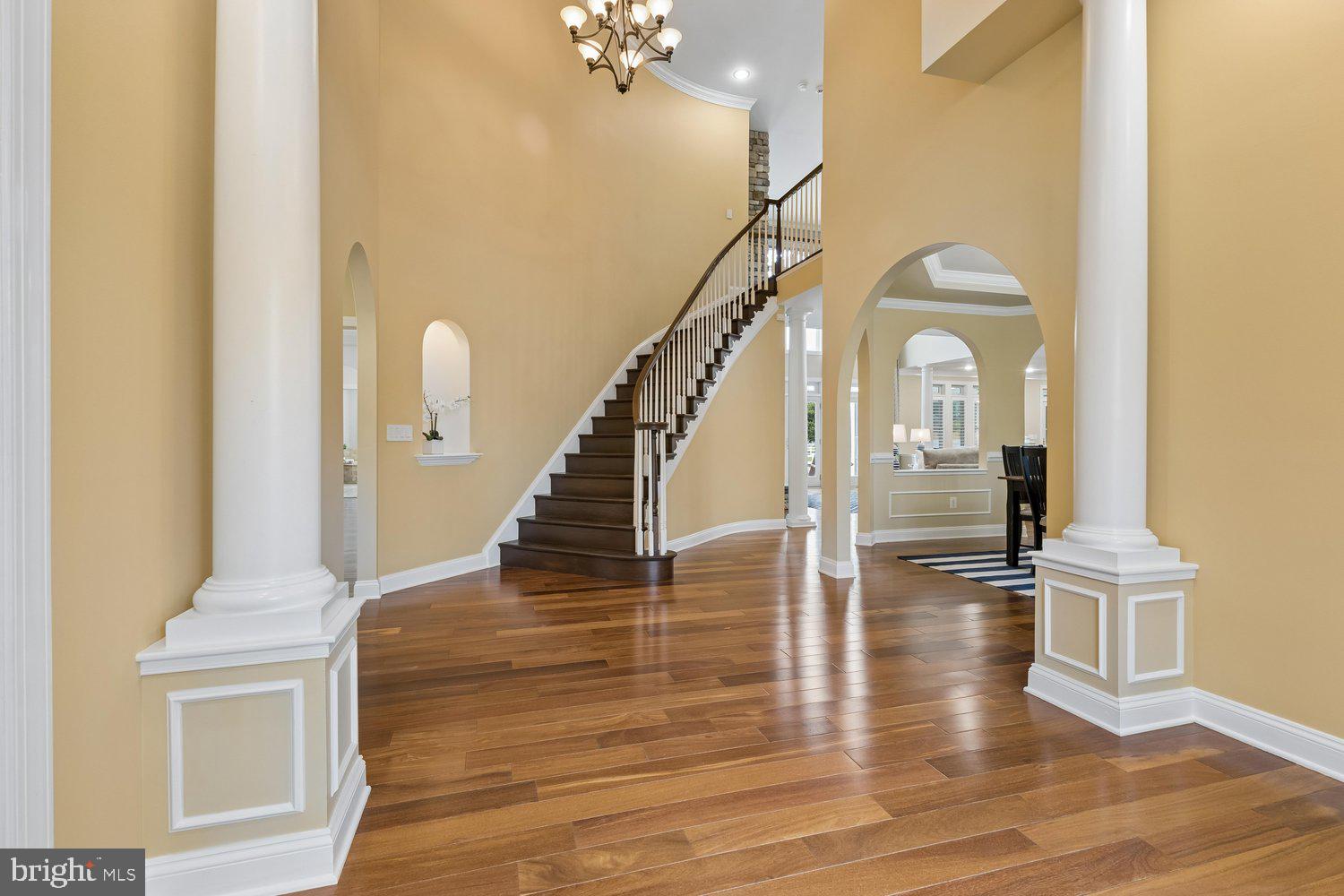 313 Wye Road Queenstown, MD 21658 - Photo 27 of 132 Elegant foyer with sweeping staircase.