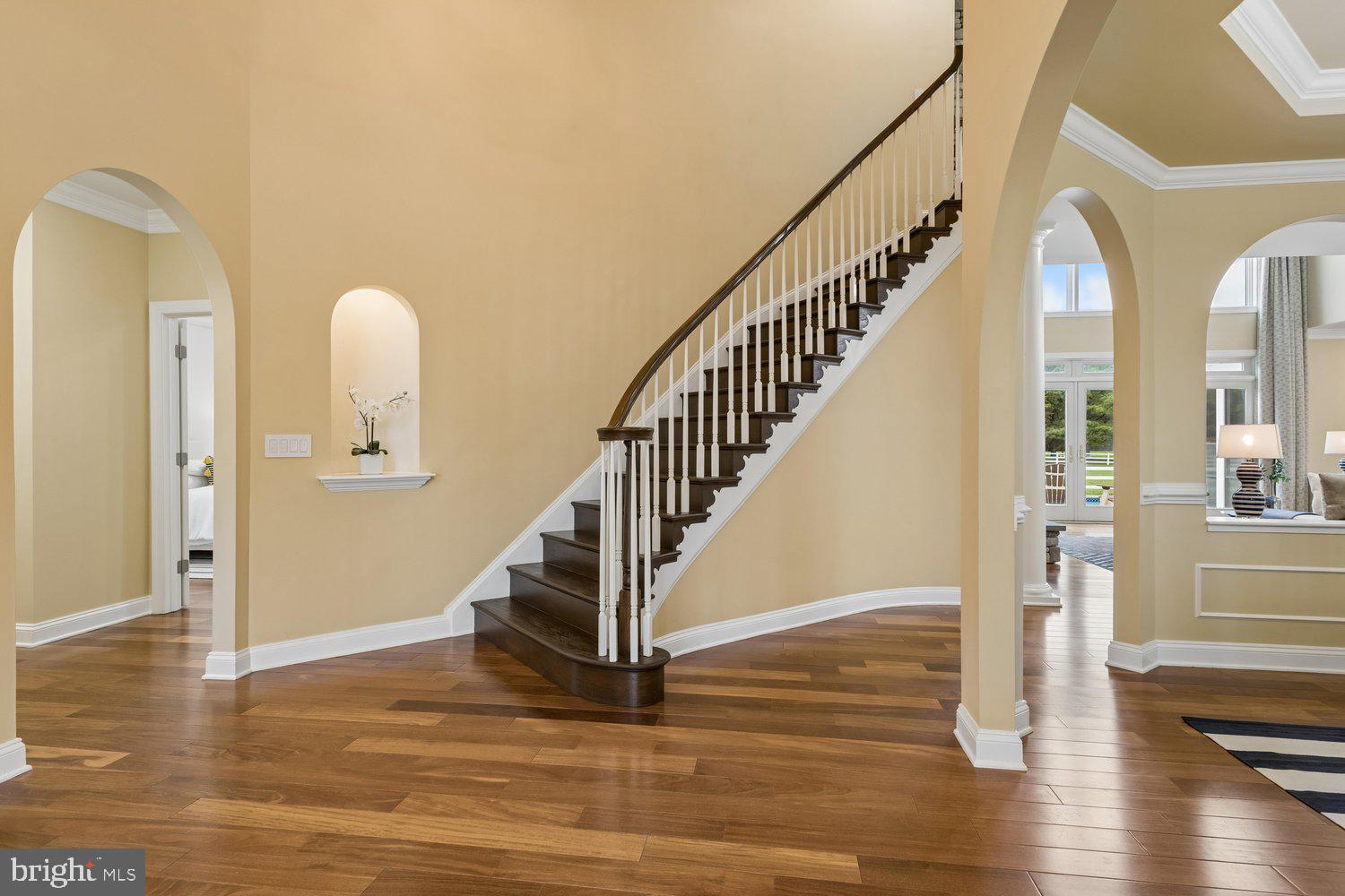 313 Wye Road Queenstown, MD 21658 - Photo 28 of 132 Elegant foyer with sweeping staircase.