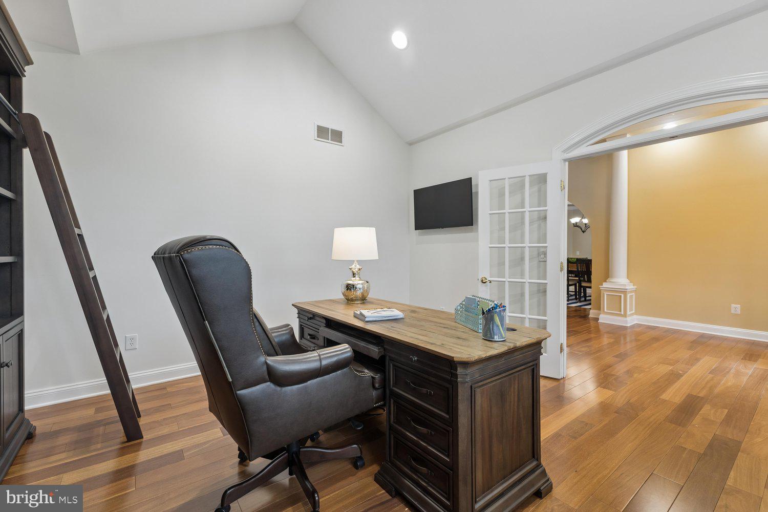 313 Wye Road Queenstown, MD 21658 - Photo 33 of 132 Elegant home office with warm wooden tones.