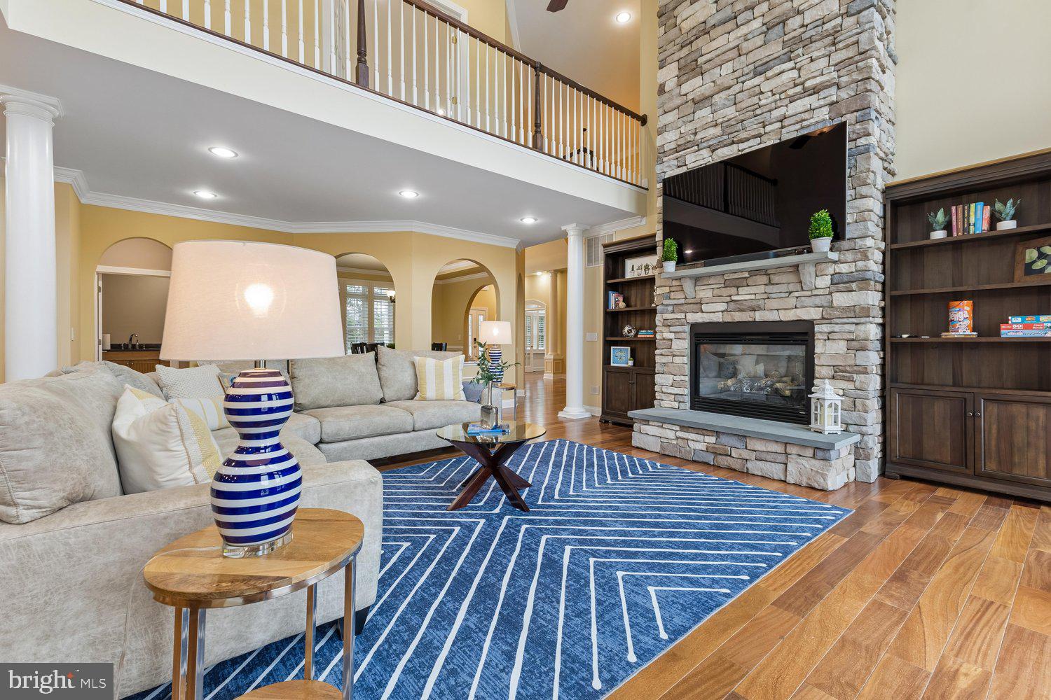 313 Wye Road Queenstown, MD 21658 - Photo 35 of 132 Inviting living space with elegant stone accents.