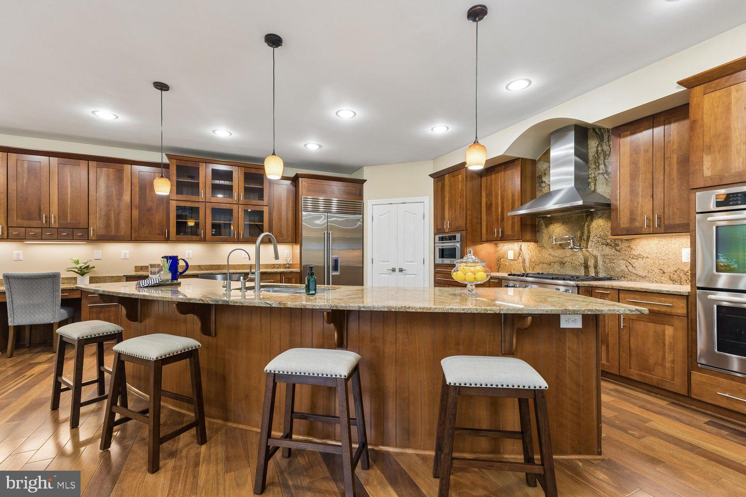 313 Wye Road Queenstown, MD 21658 - Photo 39 of 132 Warm wood tones enhance this inviting kitchen.