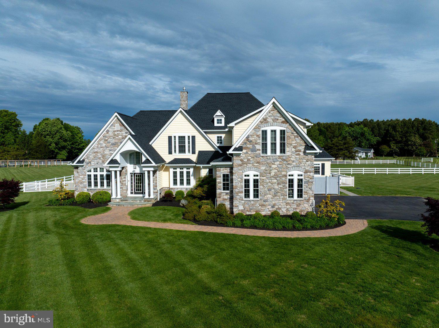313 Wye Road Queenstown, MD 21658 - Photo 4 of 132 Elegant stone-clad home in lush surroundings.