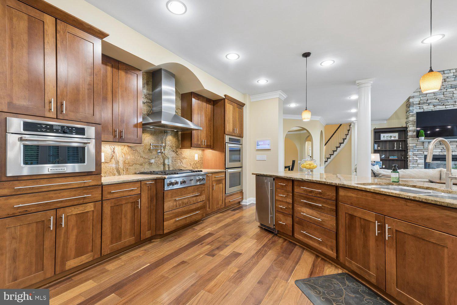 313 Wye Road Queenstown, MD 21658 - Photo 41 of 132 Warm wood tones enhance this inviting kitchen.