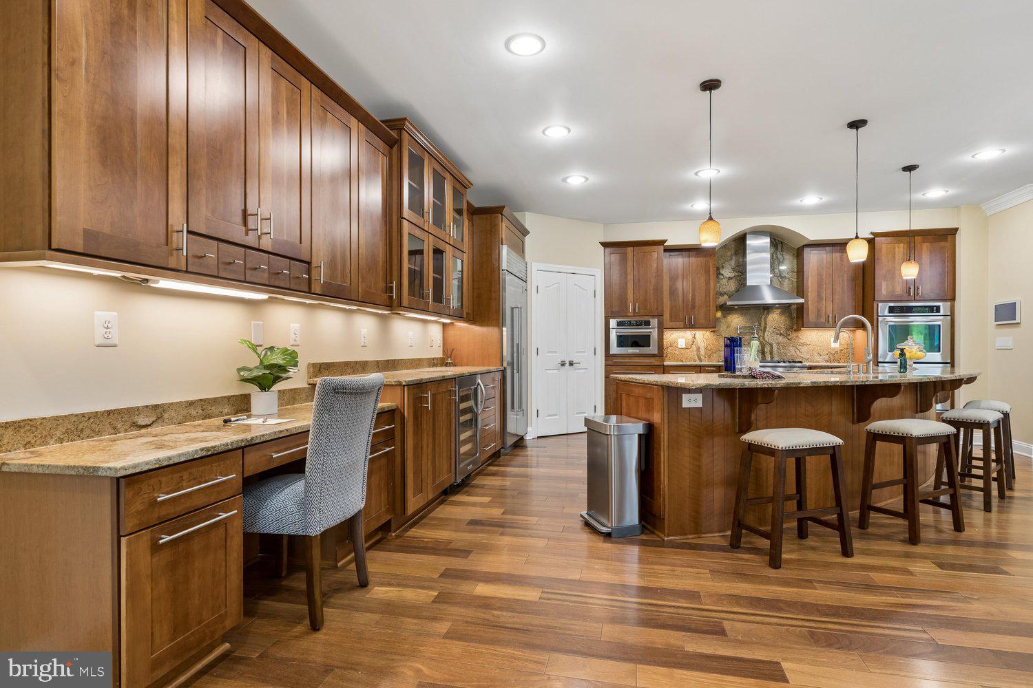 313 Wye Road Queenstown, MD 21658 - Photo 42 of 132 Warm wood tones enhance this inviting kitchen.