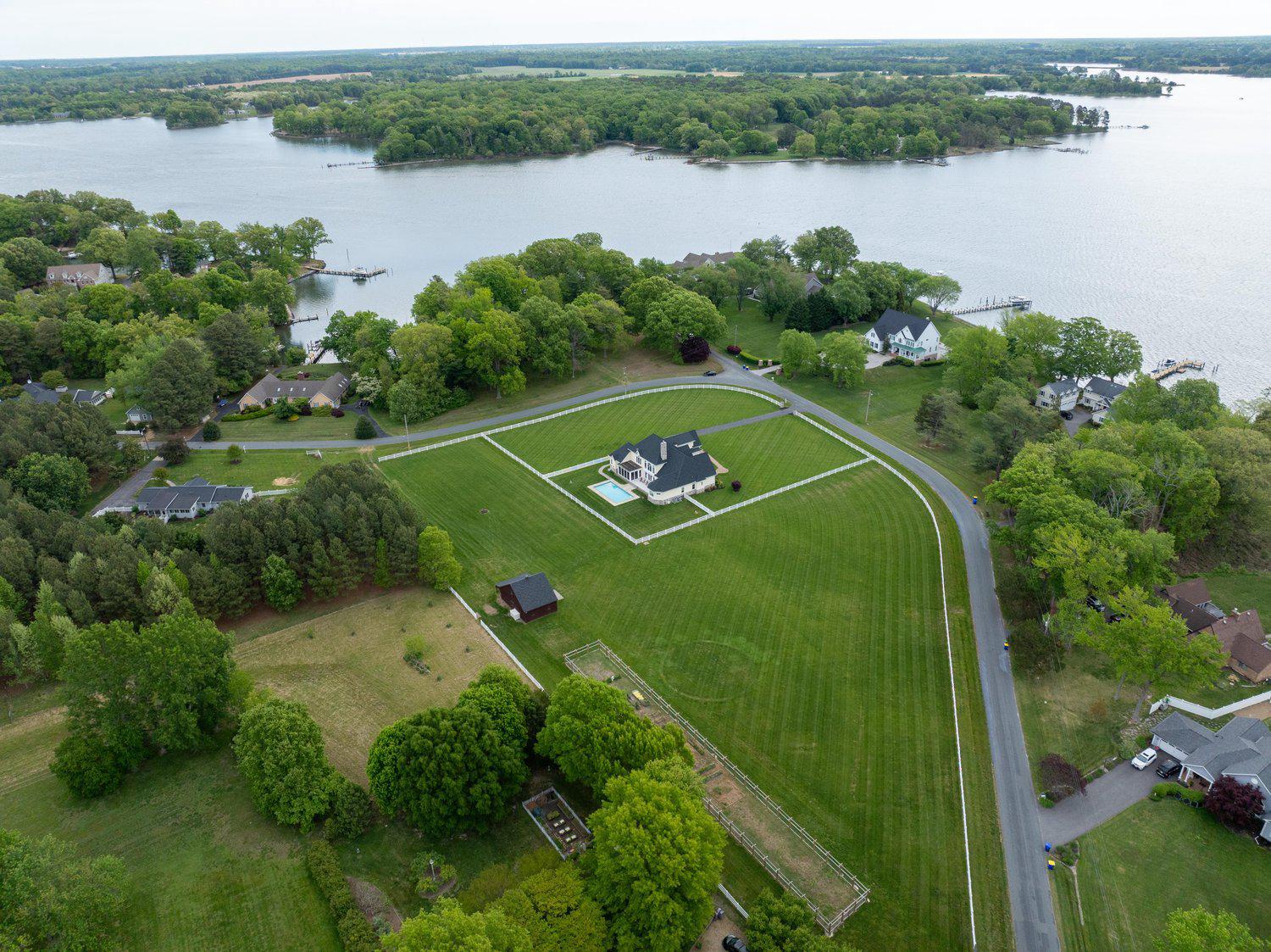313 Wye Road Queenstown, MD 21658 - Photo 7 of 132 Lush river view retreat with expansive lawns.