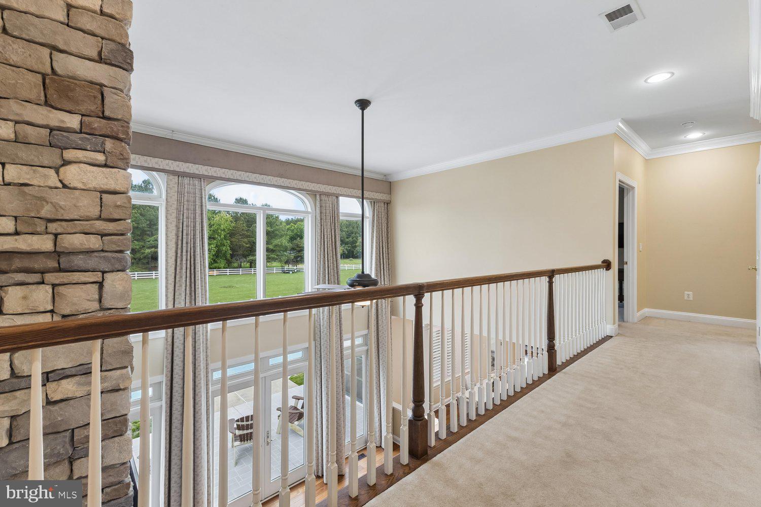 313 Wye Road Queenstown, MD 21658 - Photo 74 of 132 Elegant balcony with scenic views beyond.