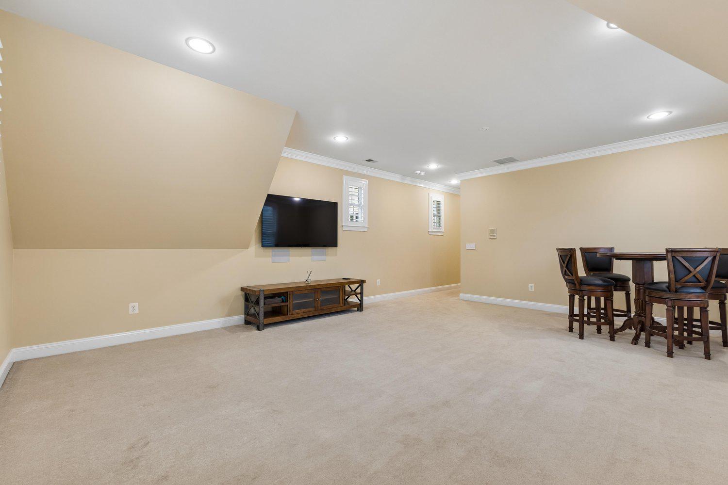313 Wye Road Queenstown, MD 21658 - Photo 88 of 132 Spacious, inviting game room with modern accents.