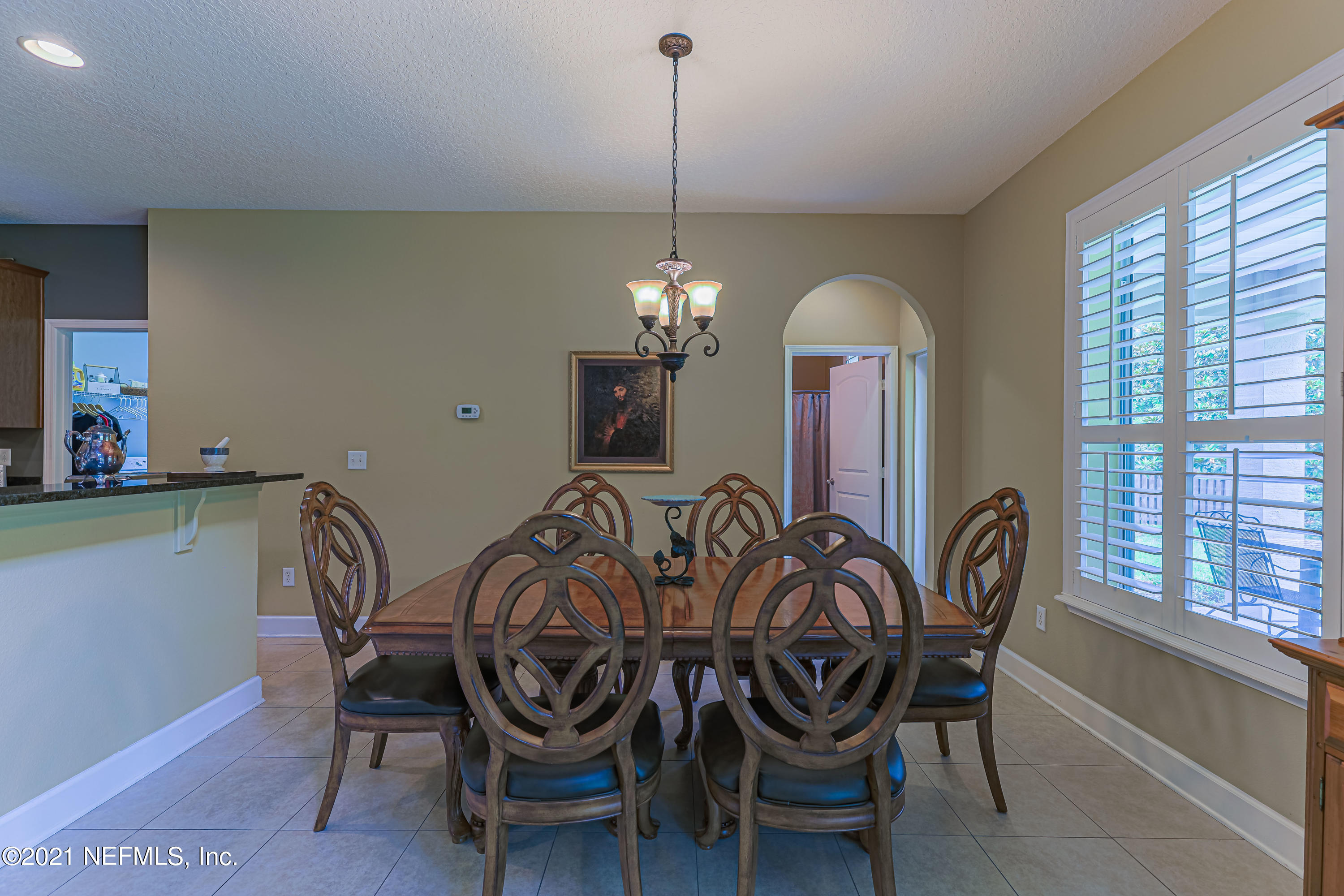 132 North Atherley Road St. Augustine, FL 32092 - Photo 14 of 40 a view of a dining room with furniture window and outside view
