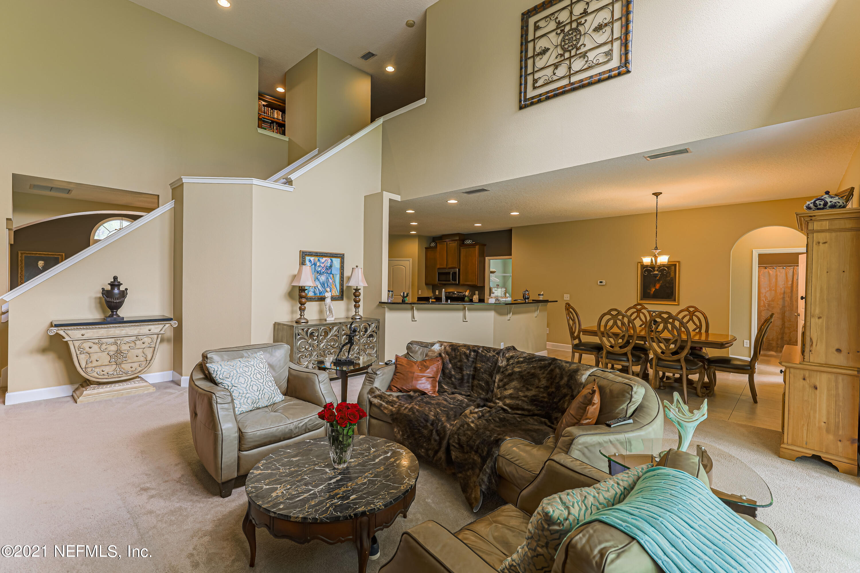 132 North Atherley Road St. Augustine, FL 32092 - Photo 17 of 40 a living room with furniture and wooden floor