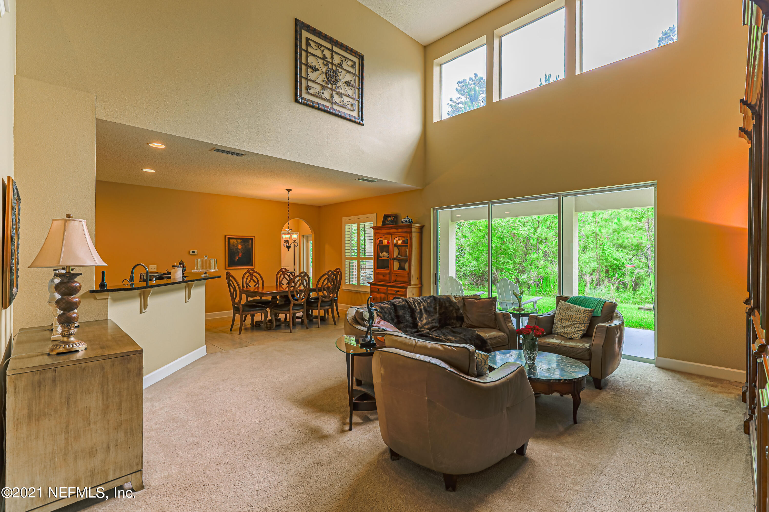 132 North Atherley Road St. Augustine, FL 32092 - Photo 18 of 40 a living room with furniture and a large window