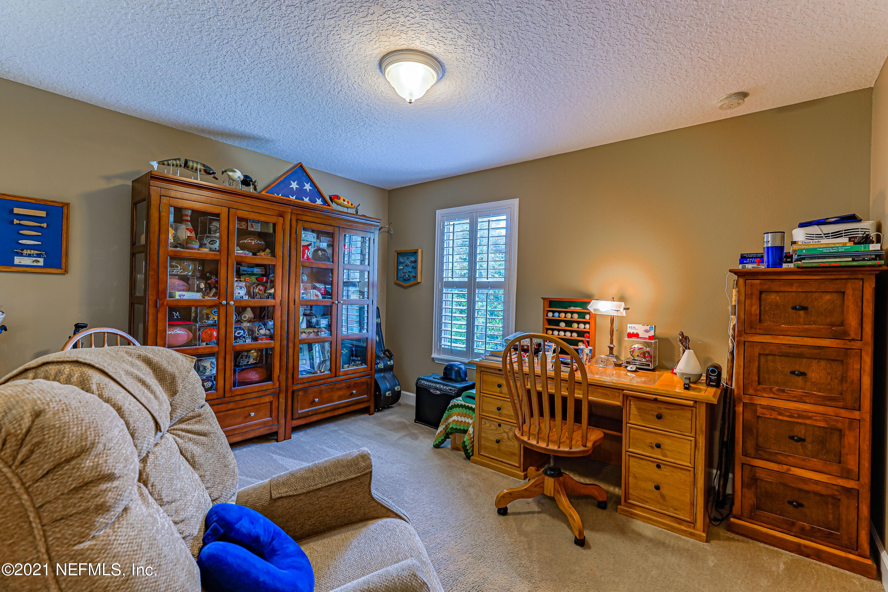 132 North Atherley Road St. Augustine, FL 32092 - Photo 32 of 40 a room with furniture and a gym equipment