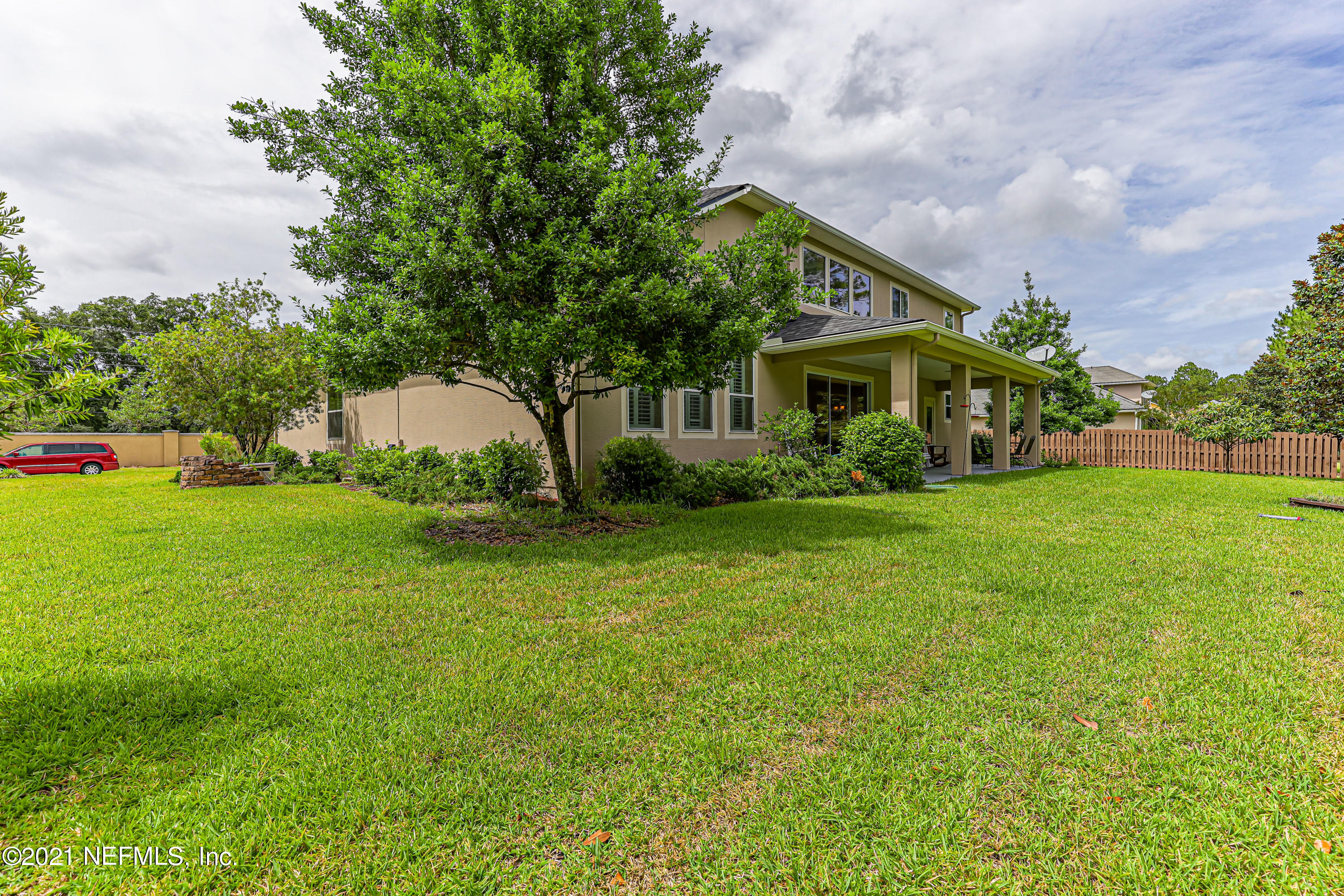 132 North Atherley Road St. Augustine, FL 32092 - Photo 38 of 40 a front view of house with yard and green space