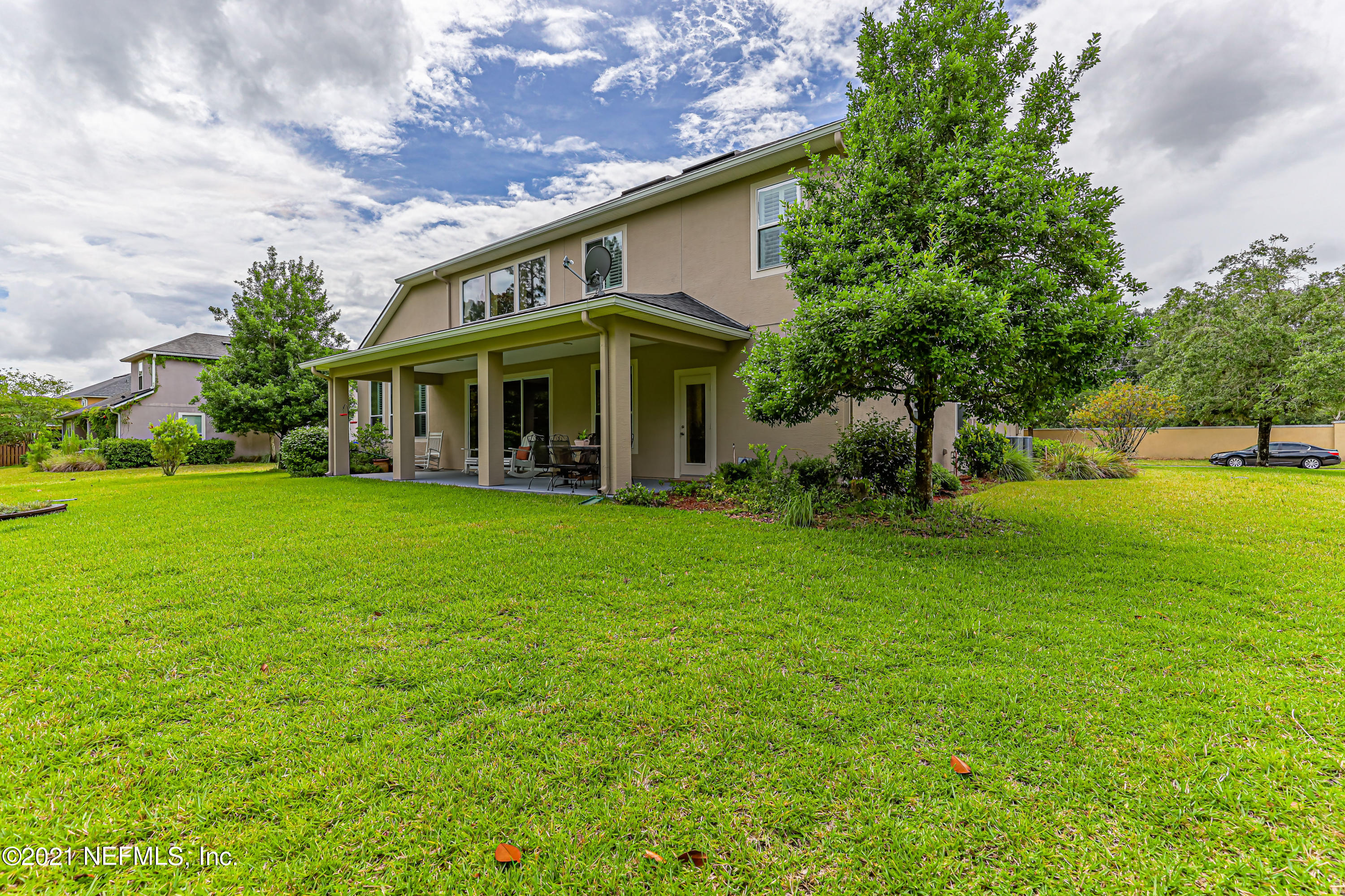 132 North Atherley Road St. Augustine, FL 32092 - Photo 40 of 40 a view of a house with a big yard plants and large trees