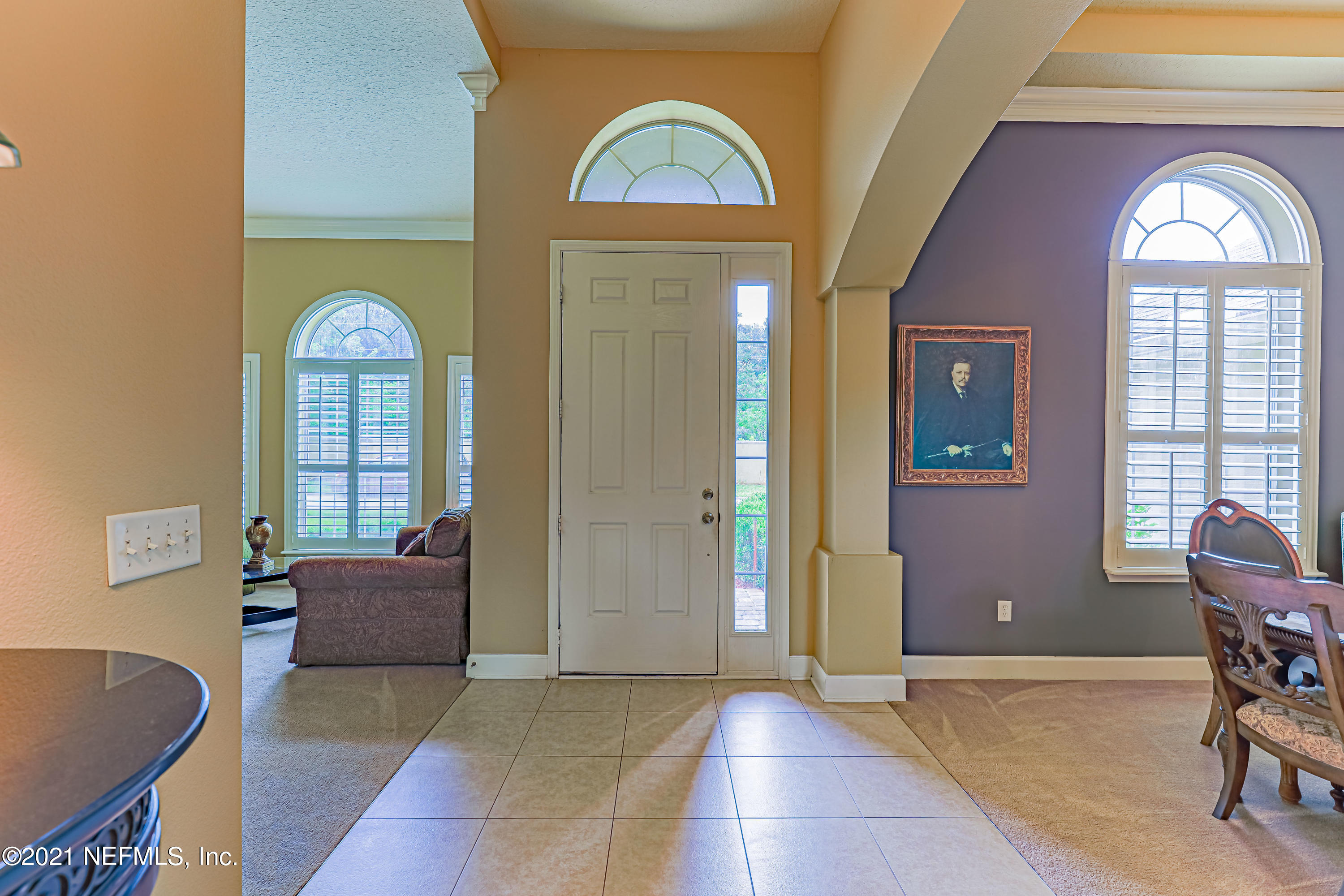 132 North Atherley Road St. Augustine, FL 32092 - Photo 7 of 40 a view of a livingroom with furniture and window