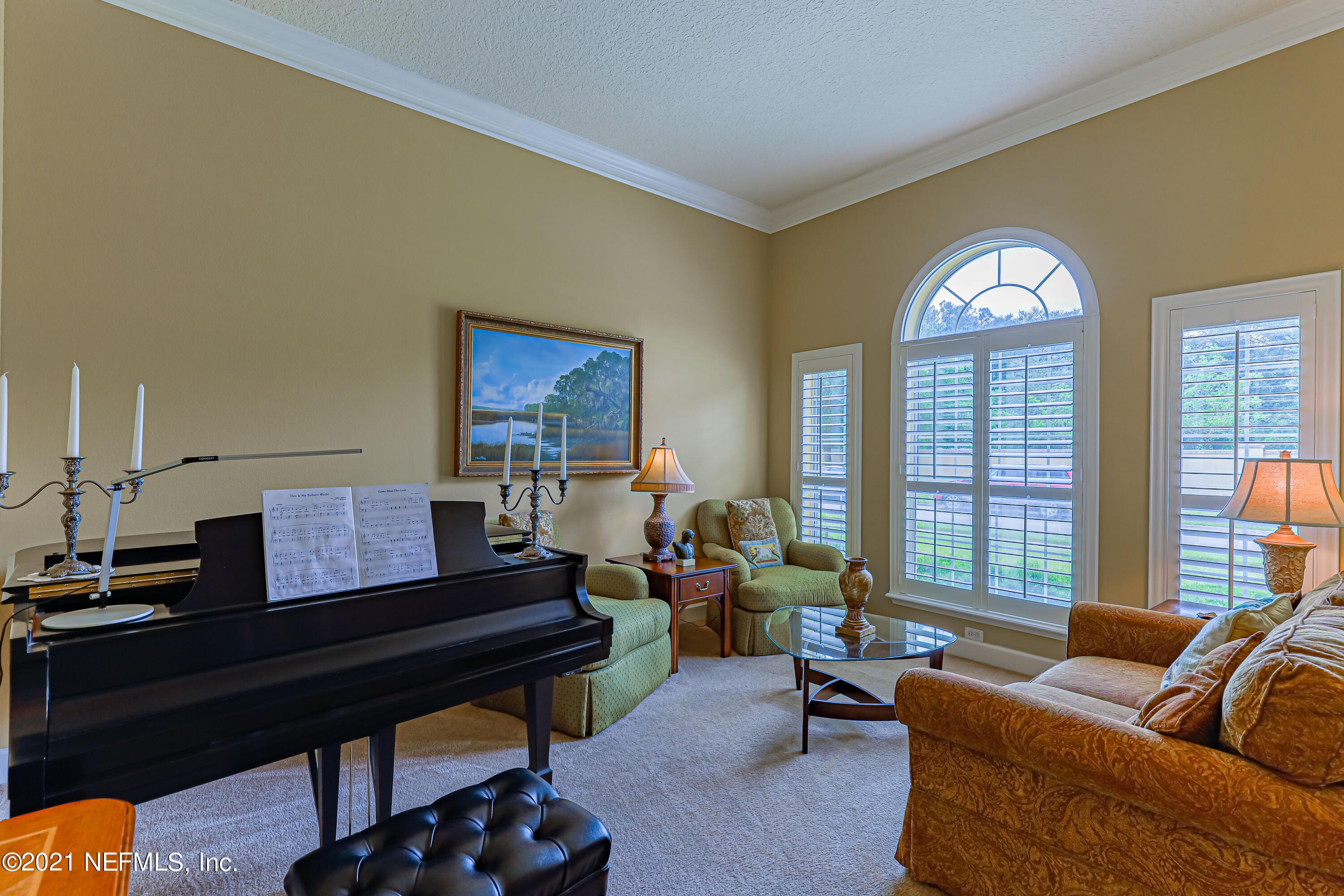 132 North Atherley Road St. Augustine, FL 32092 - Photo 9 of 40 a living room with furniture and a large window