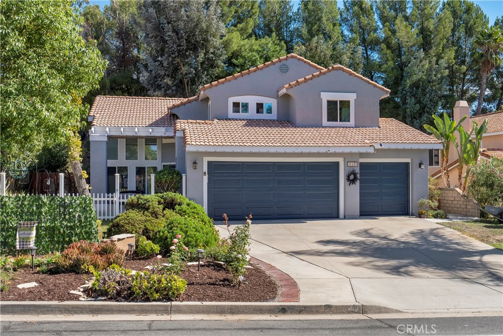 30490 Colina Verde Street Temecula, CA 92592 - Photo 1 of 1 a front view of a house with a garage