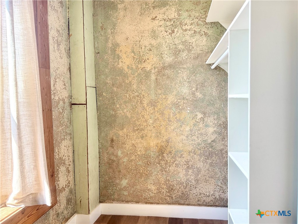 123 West May Street, Unit 1 Yoakum, TX 77995 - Photo 17 of 21 a view of a bathroom shower and a window