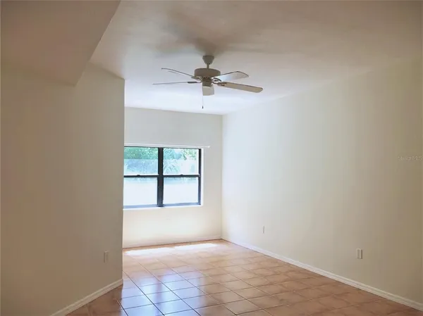 a bathroom with a bathtub sink and mirror