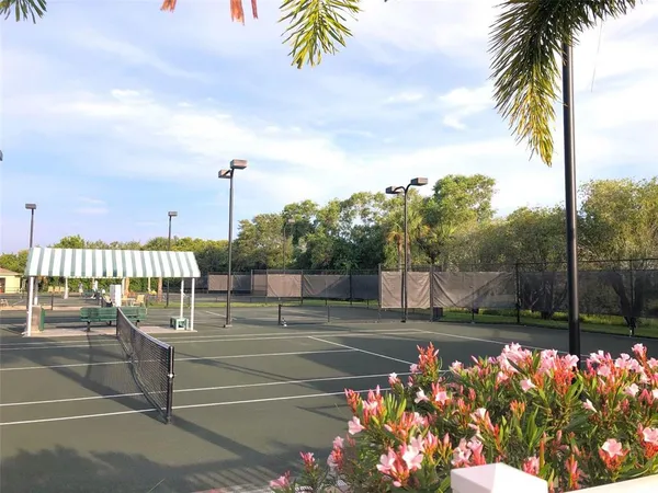 a room with gym equipment and a large window