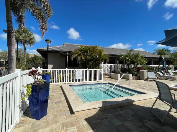 a view of a yard with palm trees