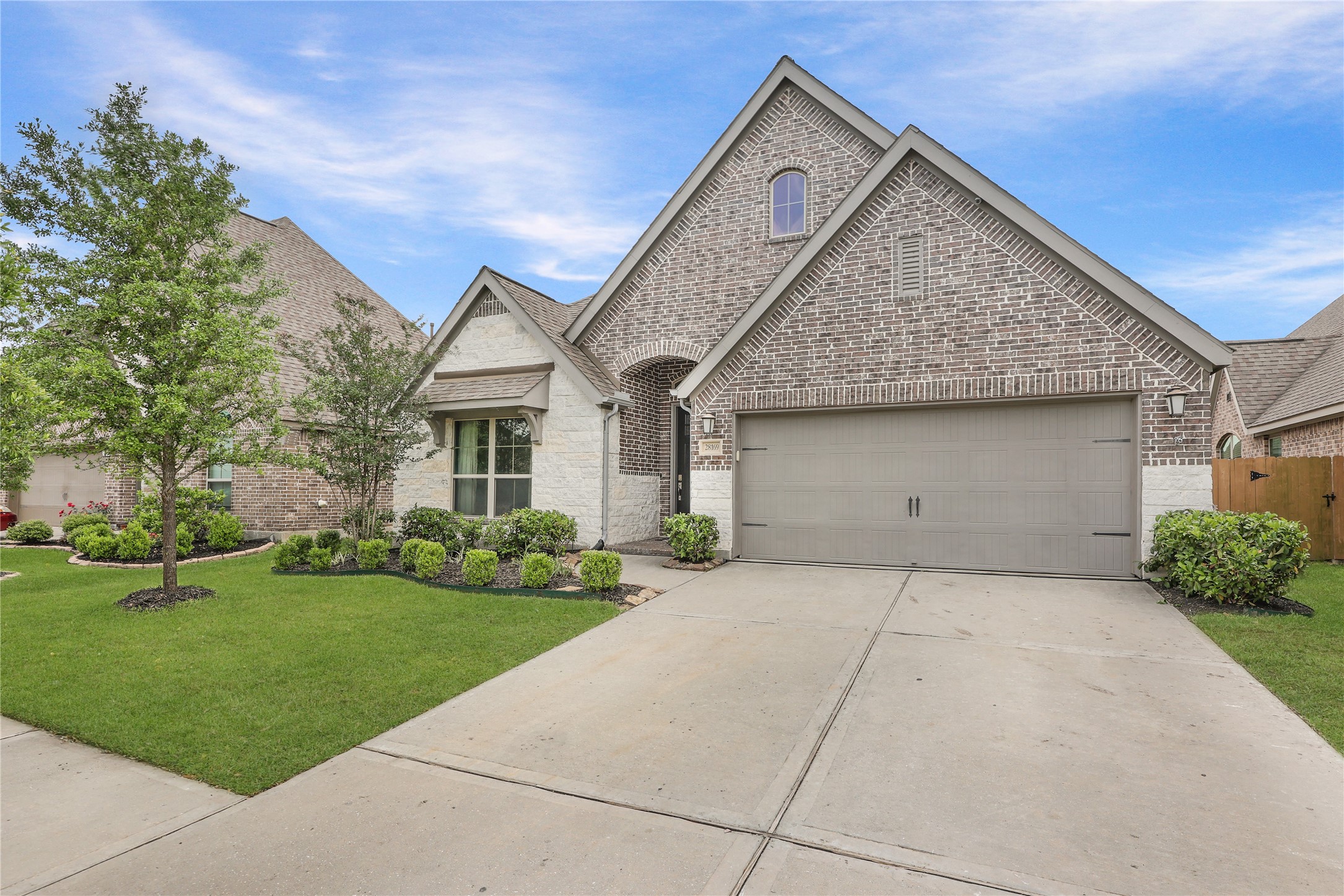 28169 Knight Peak Drive Spring, TX 77386 - Photo 28 of 33 a view of a house with a yard