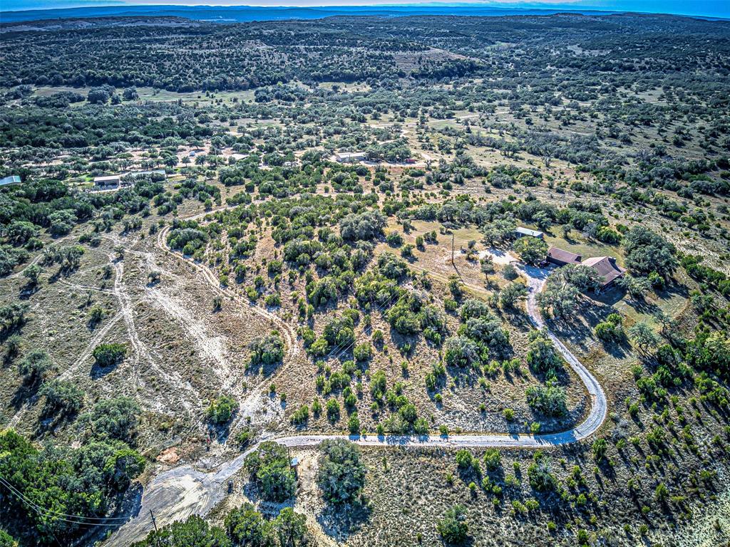 414 Hall Lane Spicewood, TX 78669 - Photo 13 of 16 an aerial view of residential houses with outdoor space