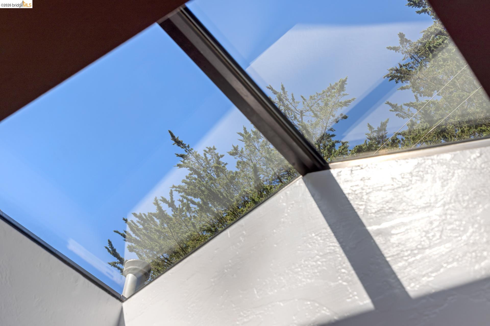 6660 Sobrante Road Oakland, CA 94611 - Photo 10 of 48 Skylight with dark framing, providing natural illumination
