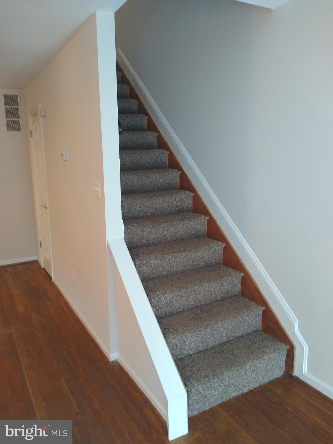 911 Elm Road Baltimore, MD 21227 - Photo 6 of 19 Main level Stairs