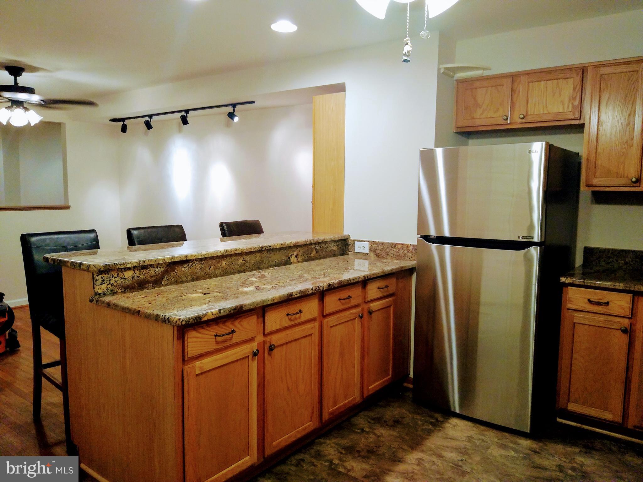 911 Elm Road Baltimore, MD 21227 - Photo 7 of 19 Kitchen Granite Counters