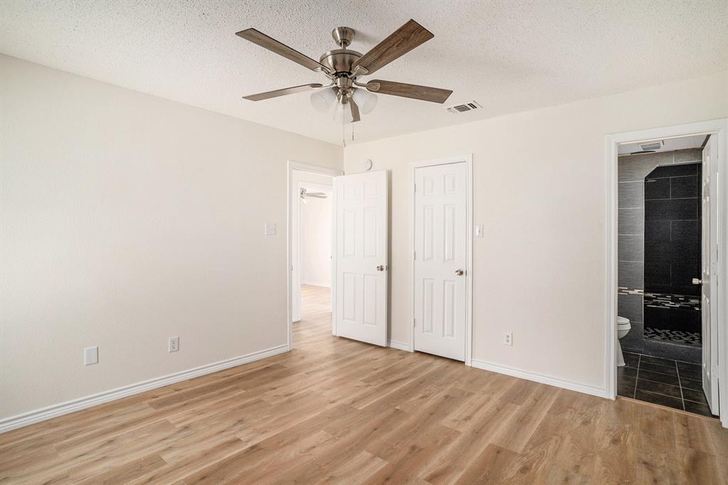 602 McAnear Street Cleburne, TX 76033 - Photo 15 of 27 wooden floor in an empty room